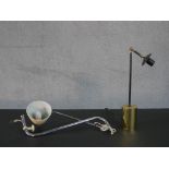 A brass adjustable table light with another vintage chrome wall light with cream enamel shade. H.