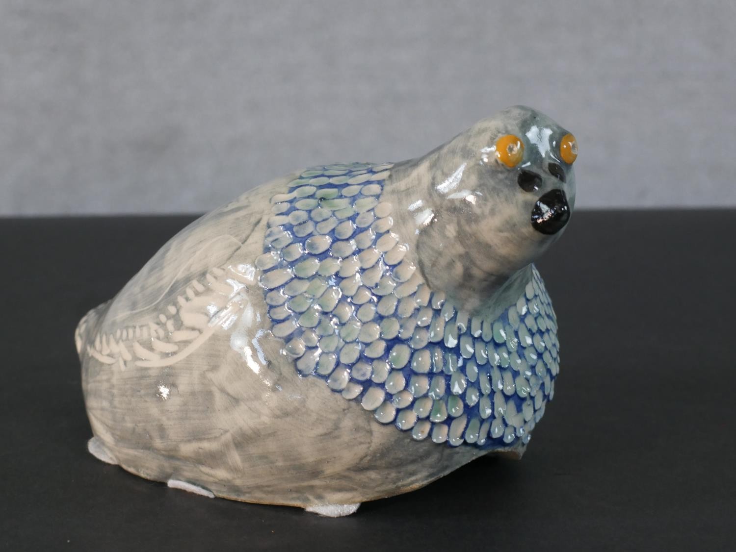 A limited edition glazed ceramic Portland Pigeon. A bespoke ceramic piece, created in