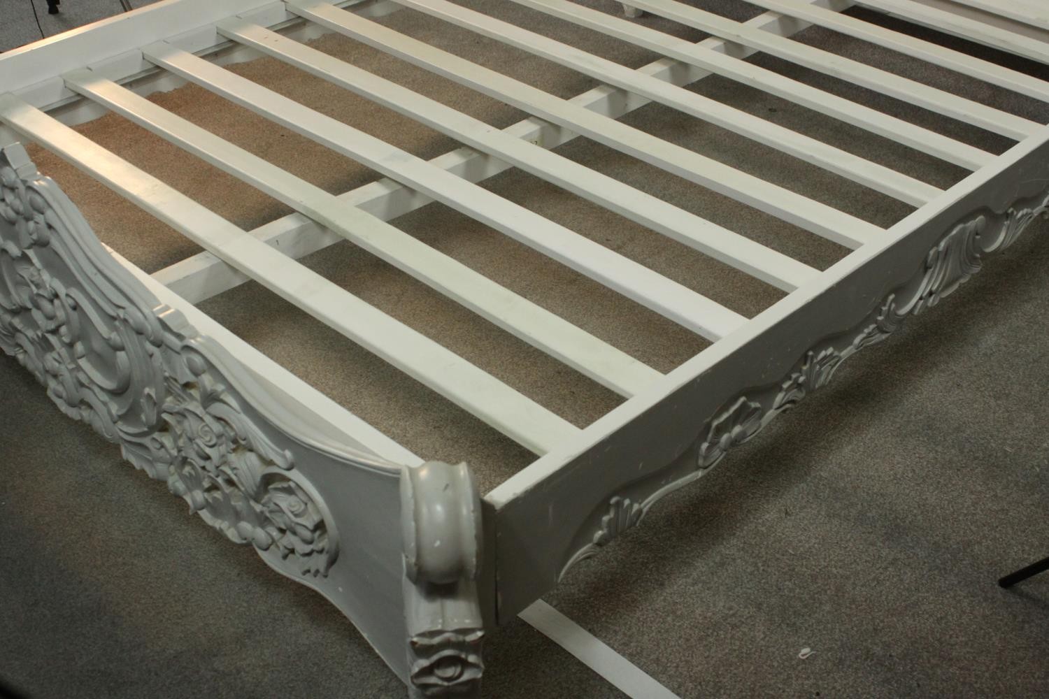 A grey and white painted ornately carved king size bed, the headboard and foot carved and pierced - Image 7 of 10