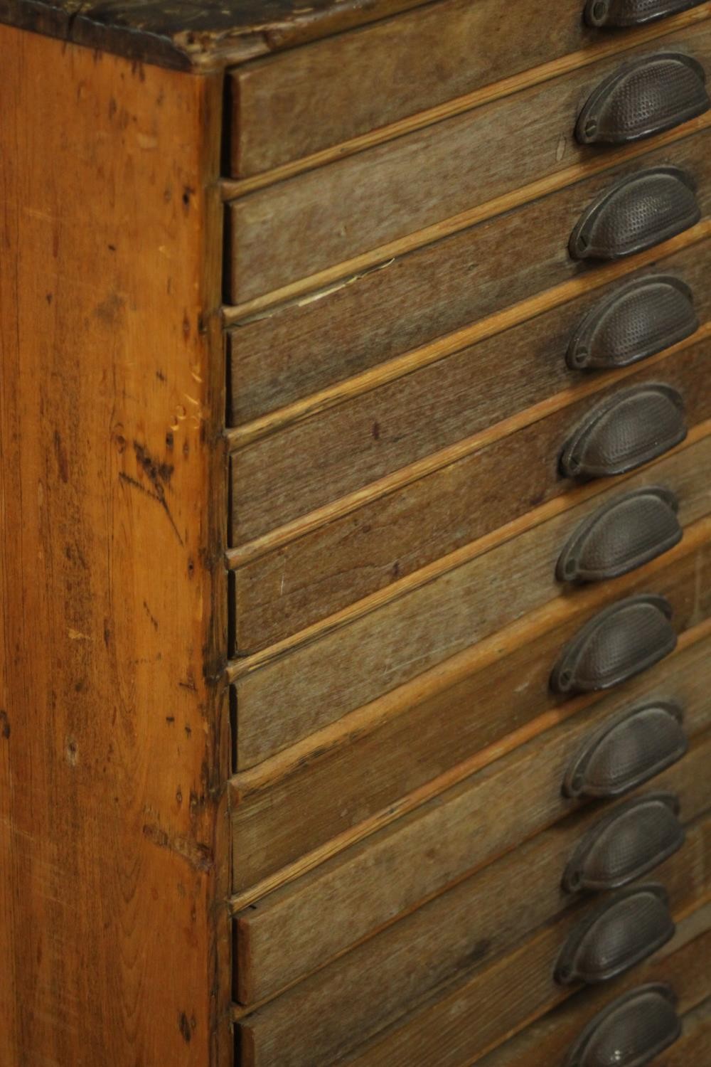 An early 20th century collector's or printer's chest of eighteen drawers with brass cup handles, - Image 5 of 7