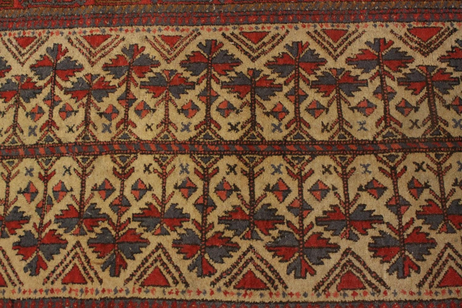 A beige ground hand made Belouch rug. L.180 W.102cm. - Image 4 of 5