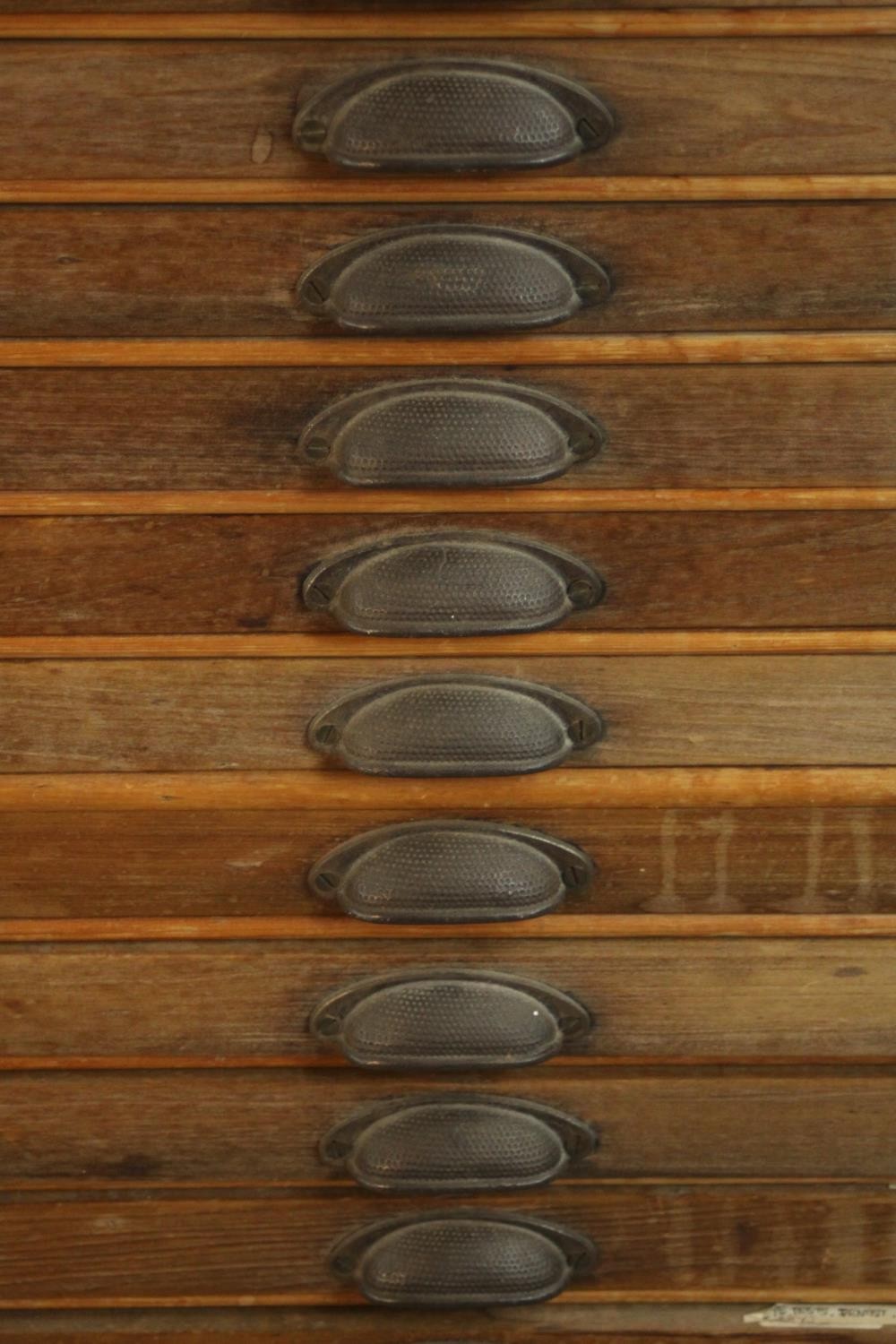 An early 20th century collector's or printer's chest of eighteen drawers with brass cup handles, - Image 3 of 7