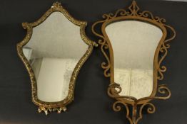 An early 20th century Italian girandole mirror in a gilt wrought iron frame with scrolling