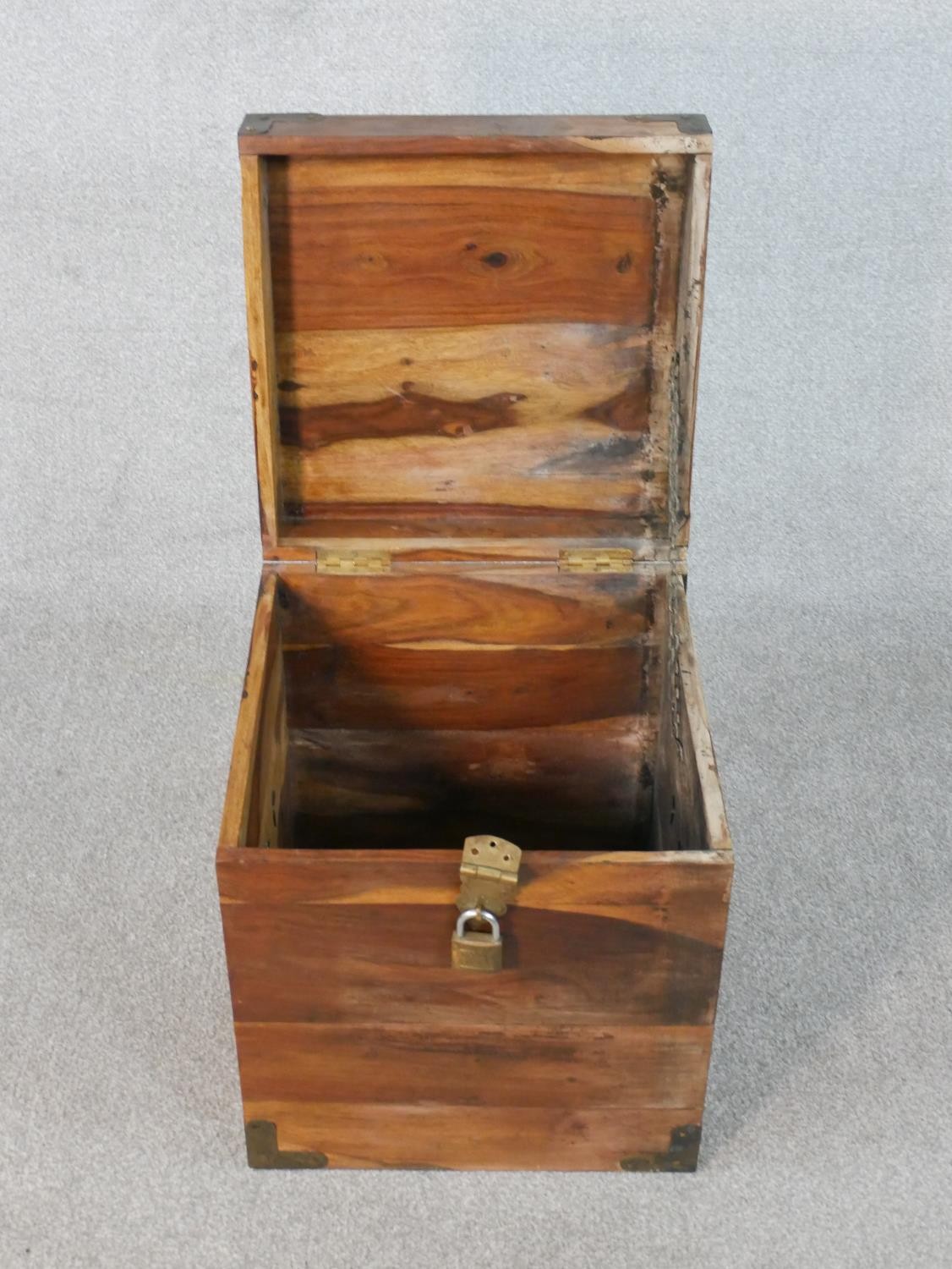 An Indian hardwood cube chest with brass detailing to the corners and padlock. H.46 W.40 D.40cm - Image 5 of 7