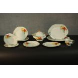 A B.P. Co Ltd Scotch Ivory part dinner service, decorated with flowers, including a tureen and a