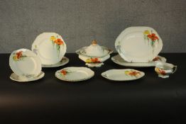 A B.P. Co Ltd Scotch Ivory part dinner service, decorated with flowers, including a tureen and a