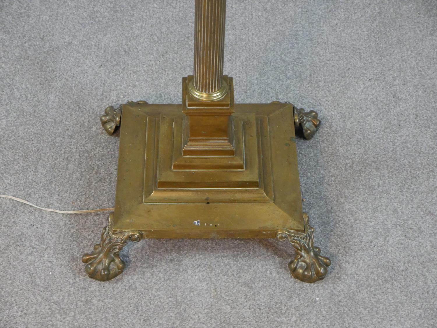 A Victorian brass fluted column design floor lamp with square base on four lion paw feet. H.170 W.38 - Image 4 of 4