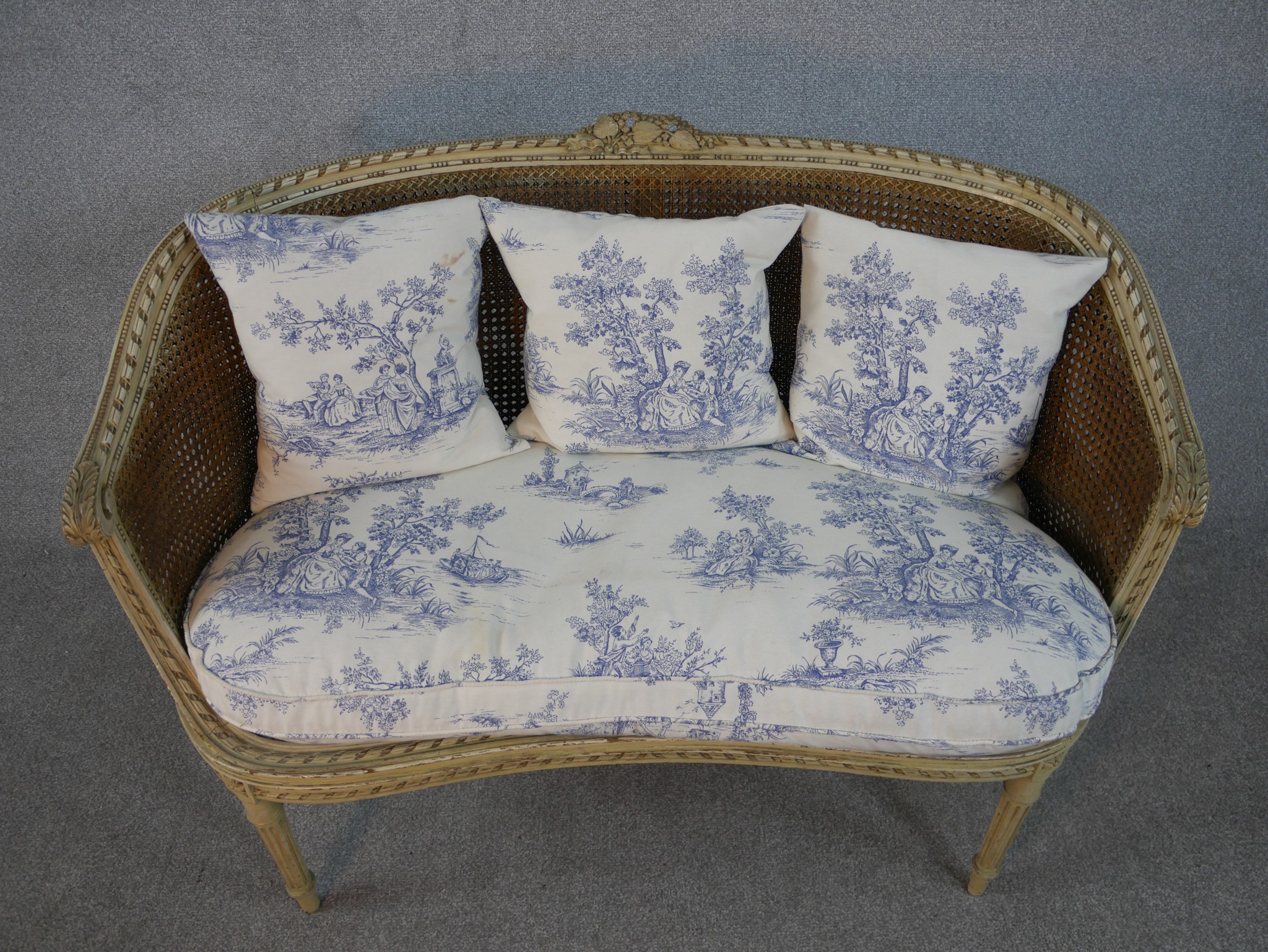 A French Louis XVI style painted canape sofa, with double caned back and sides, and loose cushions - Image 2 of 7