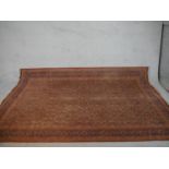 A red ground Keshan motif carpet. L.290 W.195cm