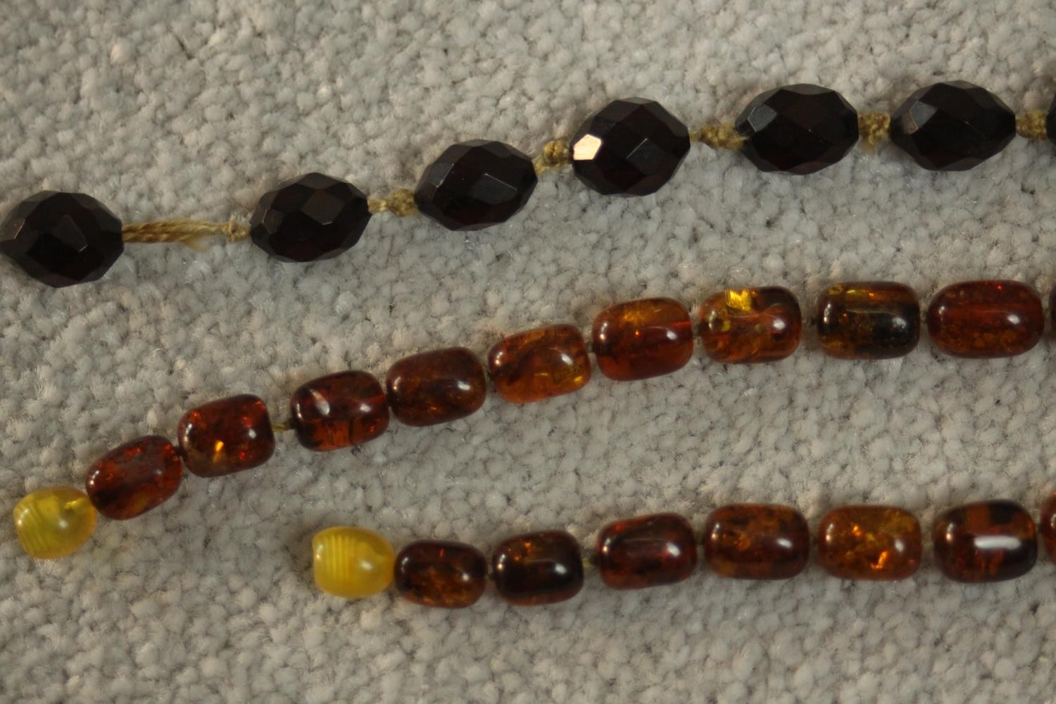 A vintage graduated Baltic amber bead necklace with a screw barrel clasp (damaged) along with a - Image 4 of 5