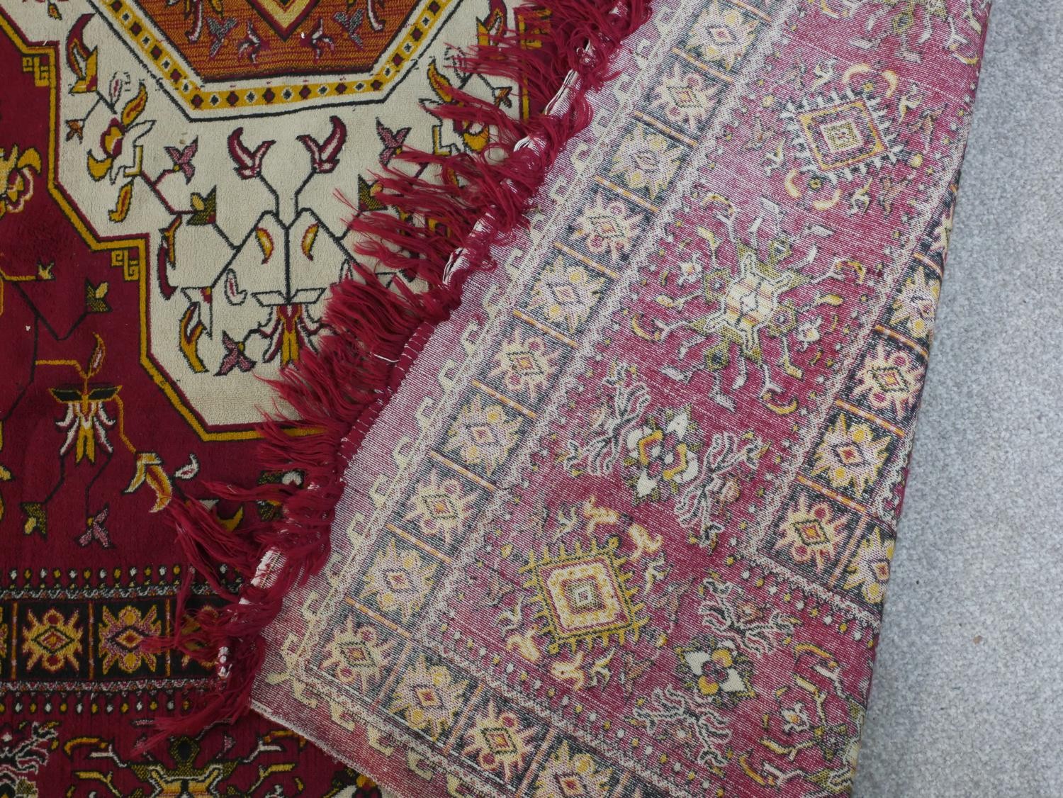 A red ground Heriz motif carpet. L.300 W.196cm - Image 5 of 5