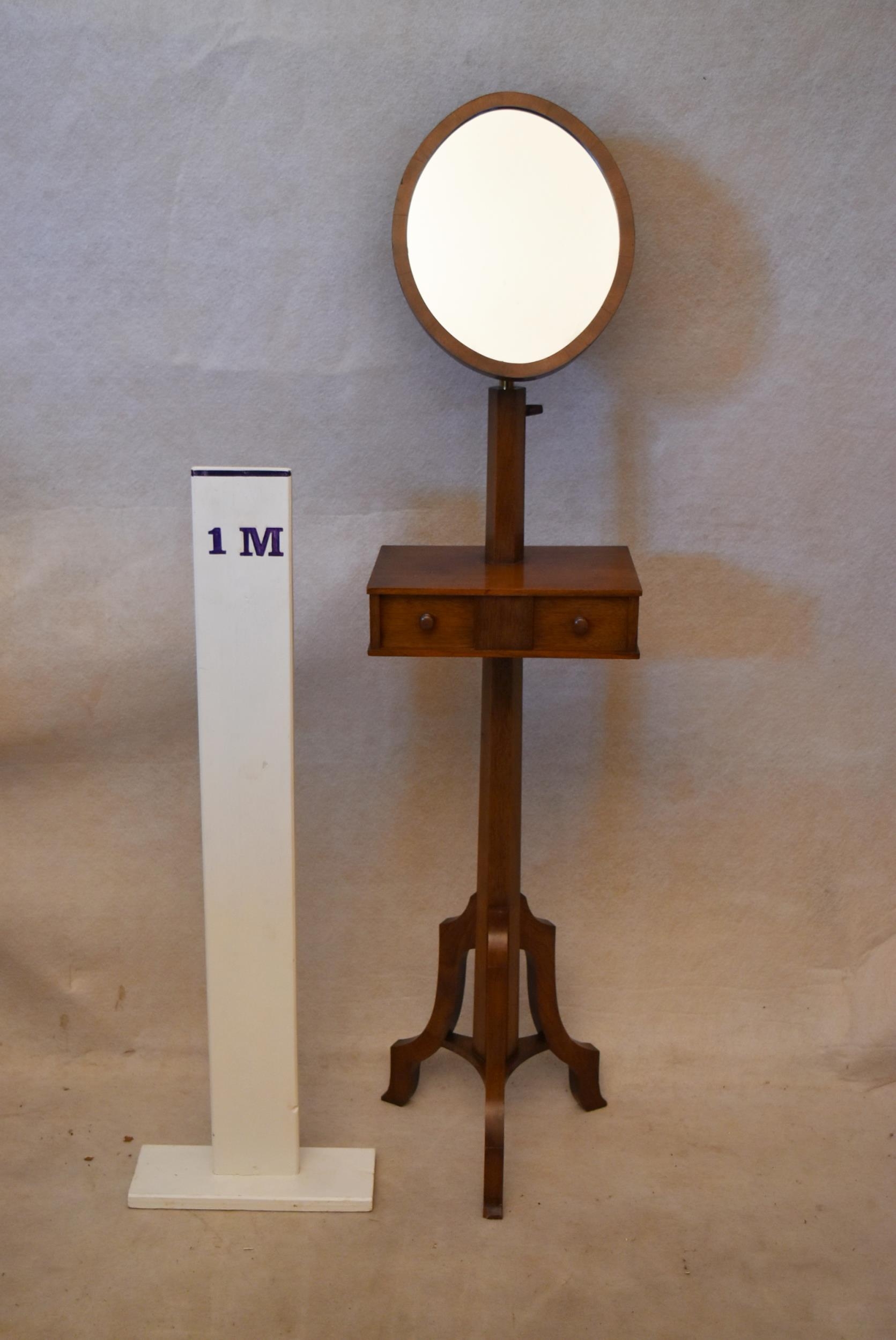 An early 20th century oak gentleman's shaving stand, with an oval mirror on a telescopic frame, - Image 2 of 3