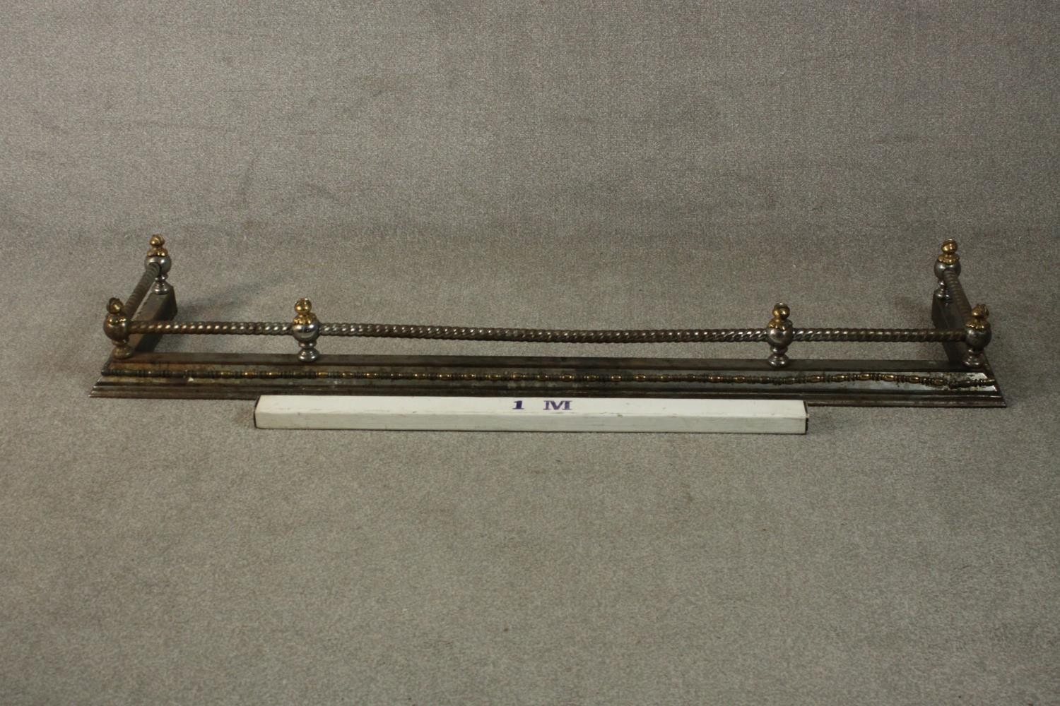 A 19th century steel and brass fender, with rope twist rail. L.170 D.40cm. - Image 2 of 9