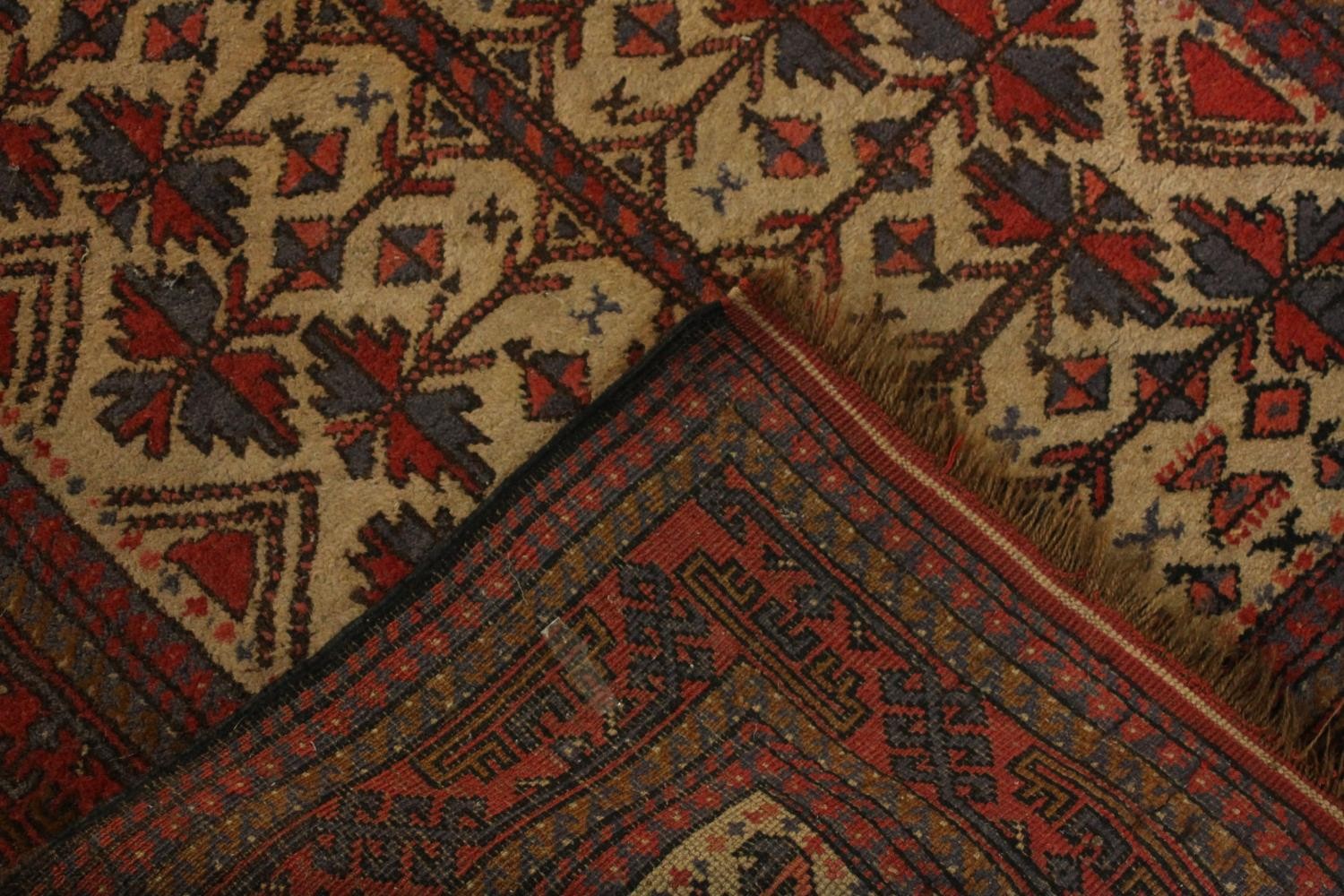 A beige ground hand made Belouch rug. L.180 W.102cm. - Image 3 of 5