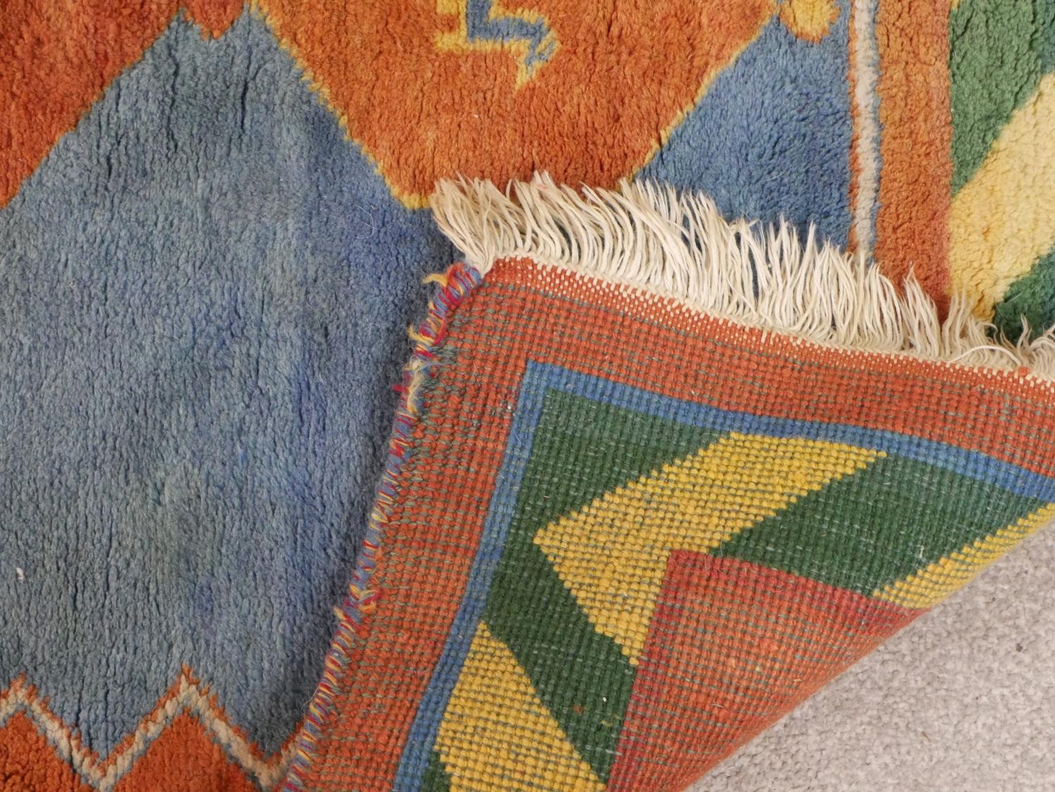 A blue ground hand made Persian Gabbeh rug. L.182 W.120cm - Image 8 of 8