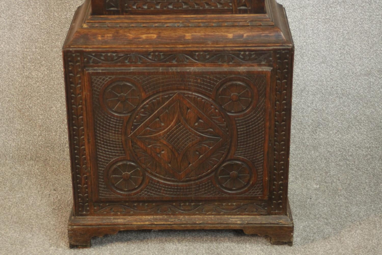 A 19th century carved oak longcase clock, the hood with a swan neck pediment and reeded columns, the - Image 13 of 13