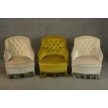 A set of three matching small Victorian style armchairs, two upholstered in beige, the other in