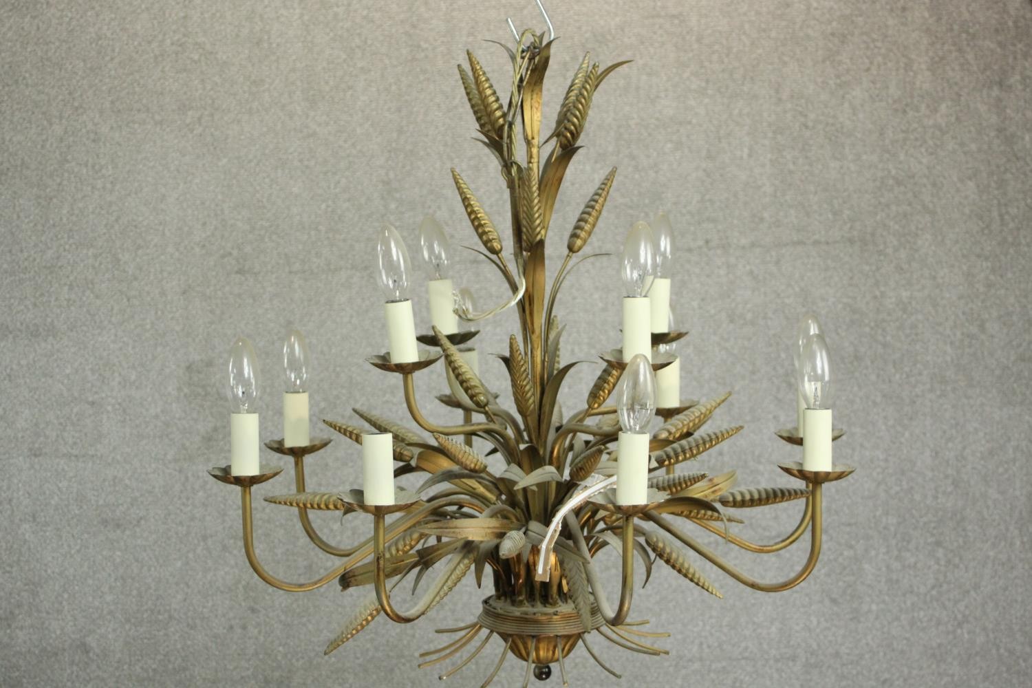 A Maison Jansen style brass and toleware chandelier, of wheatsheaf form, with twelve branches over - Image 7 of 7