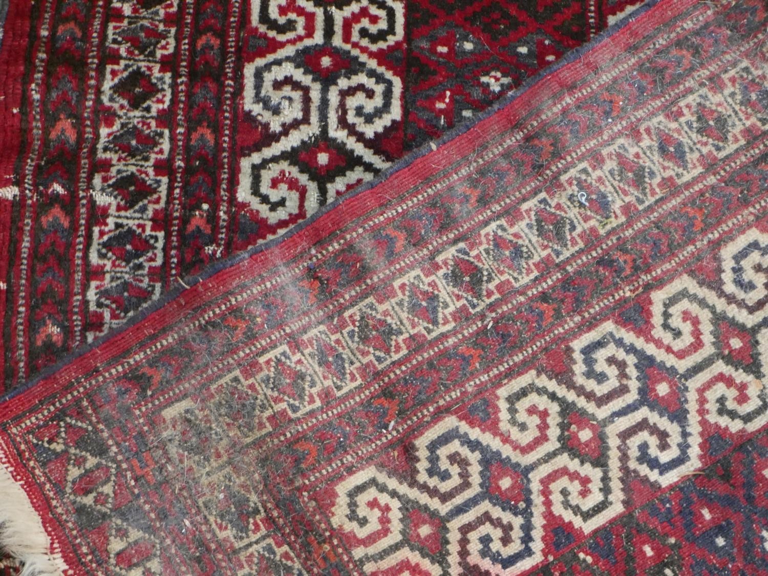 A red ground handmade Persian Turkman rug. L.115 W.100cm - Image 7 of 7