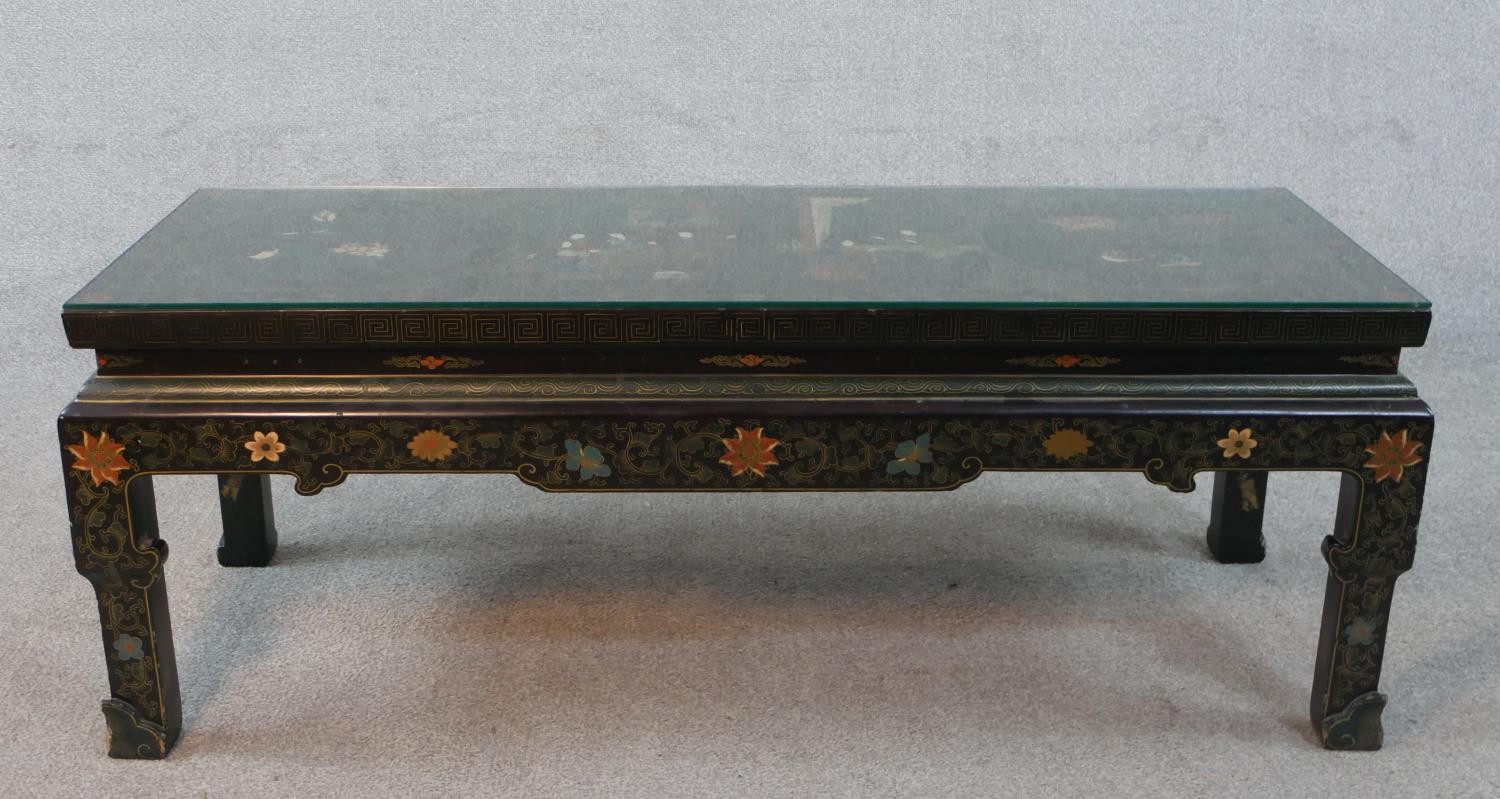 A Chinese lacquered coffee table with all over hand painted decoration. With plate glass top. H.47 - Image 2 of 6