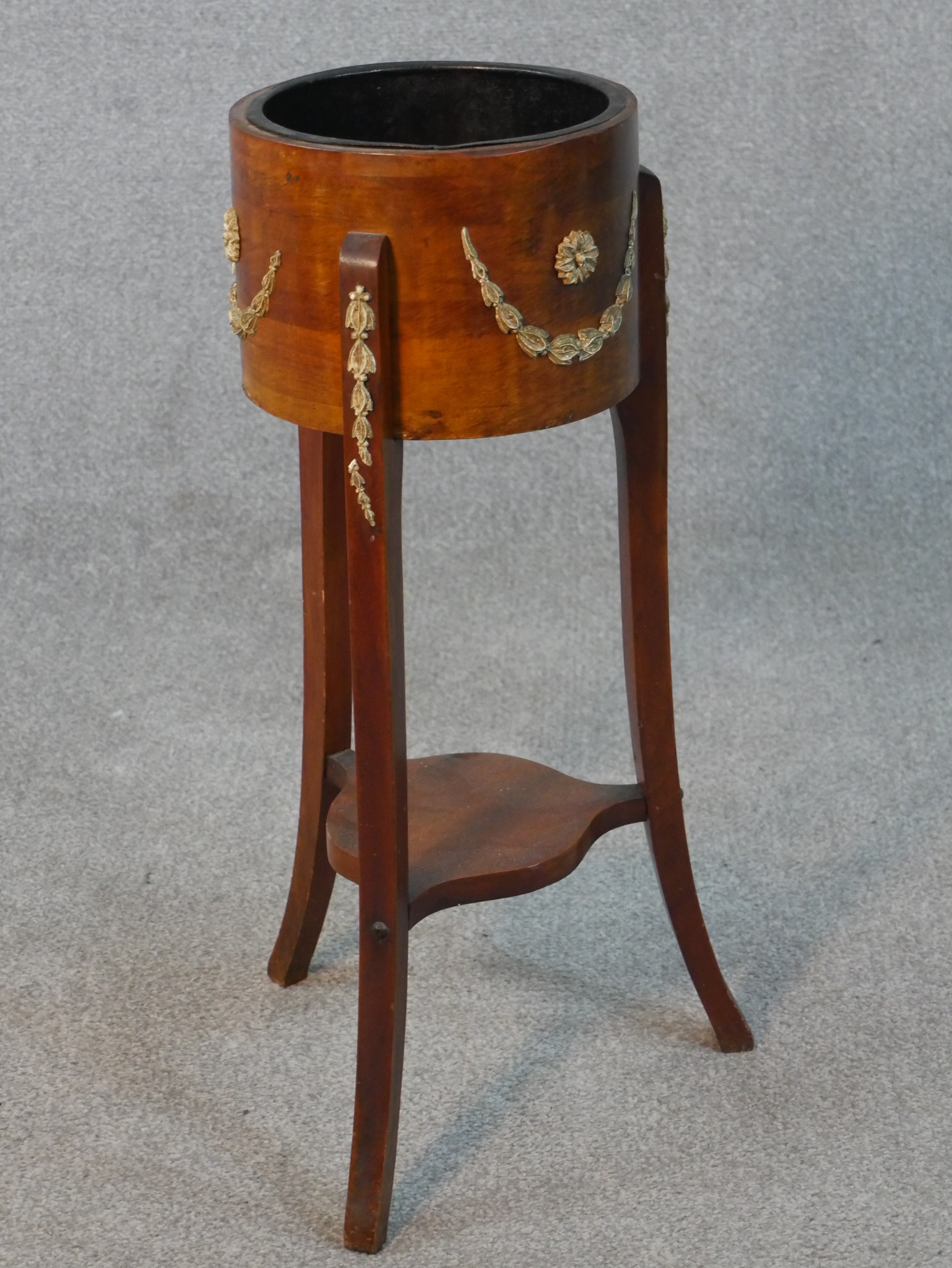 A 20th century fruitwood jardiniere stand, the circular top with gilt metal mounts, on three splayed - Image 5 of 5