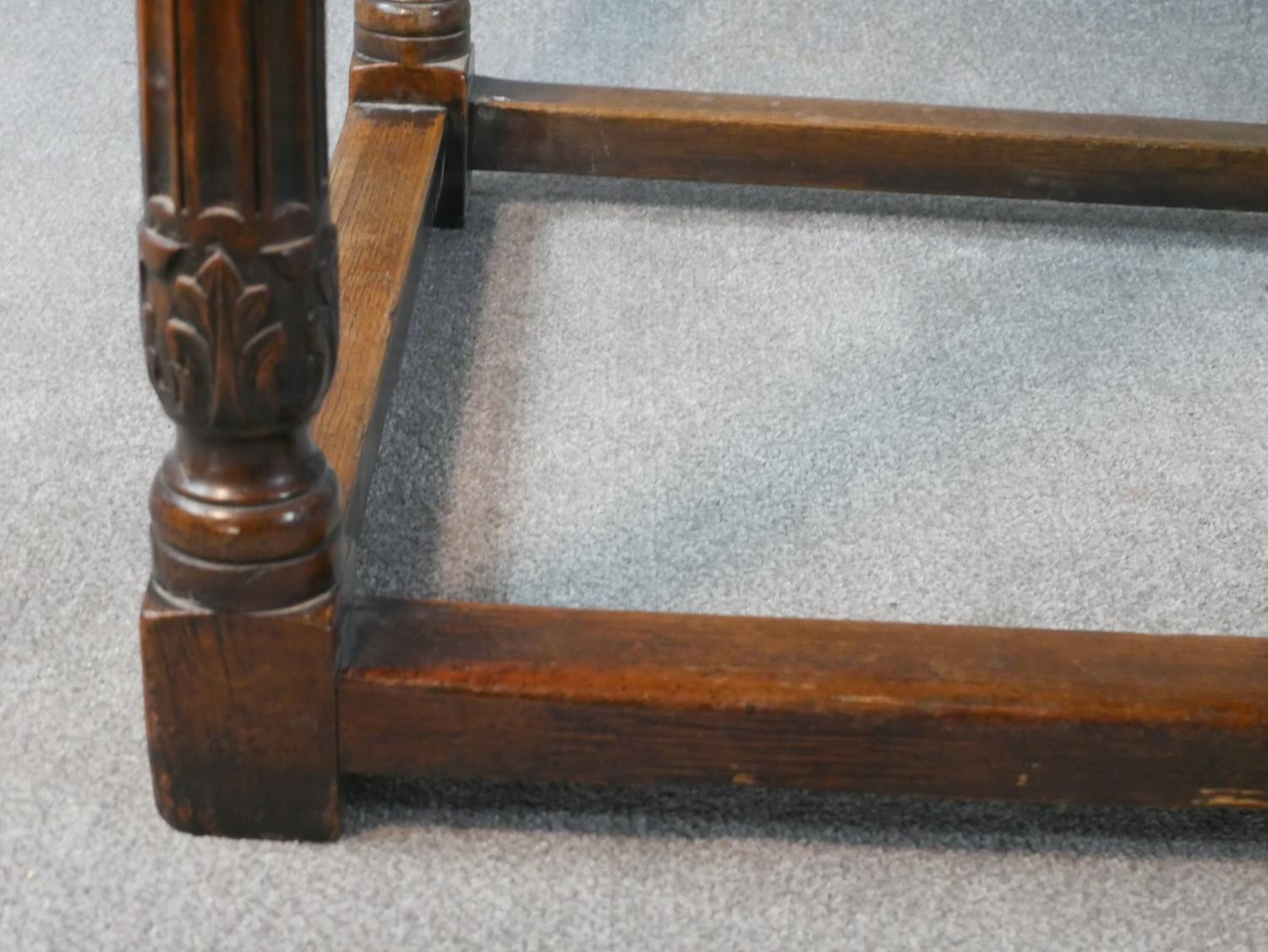 An early 20th century oak refectory dining table, the rectangular top with rounded corners over a - Image 3 of 5