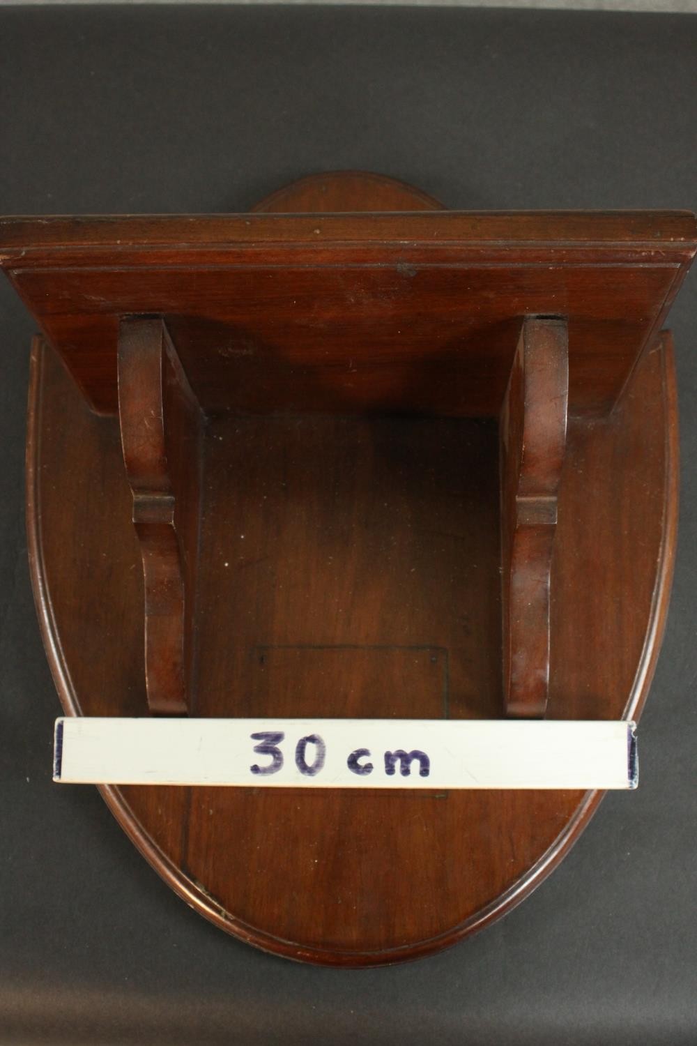 A Victorian walnut wall shelf on a shield shaped back. H.45 W.37 D.23cm. - Image 2 of 6