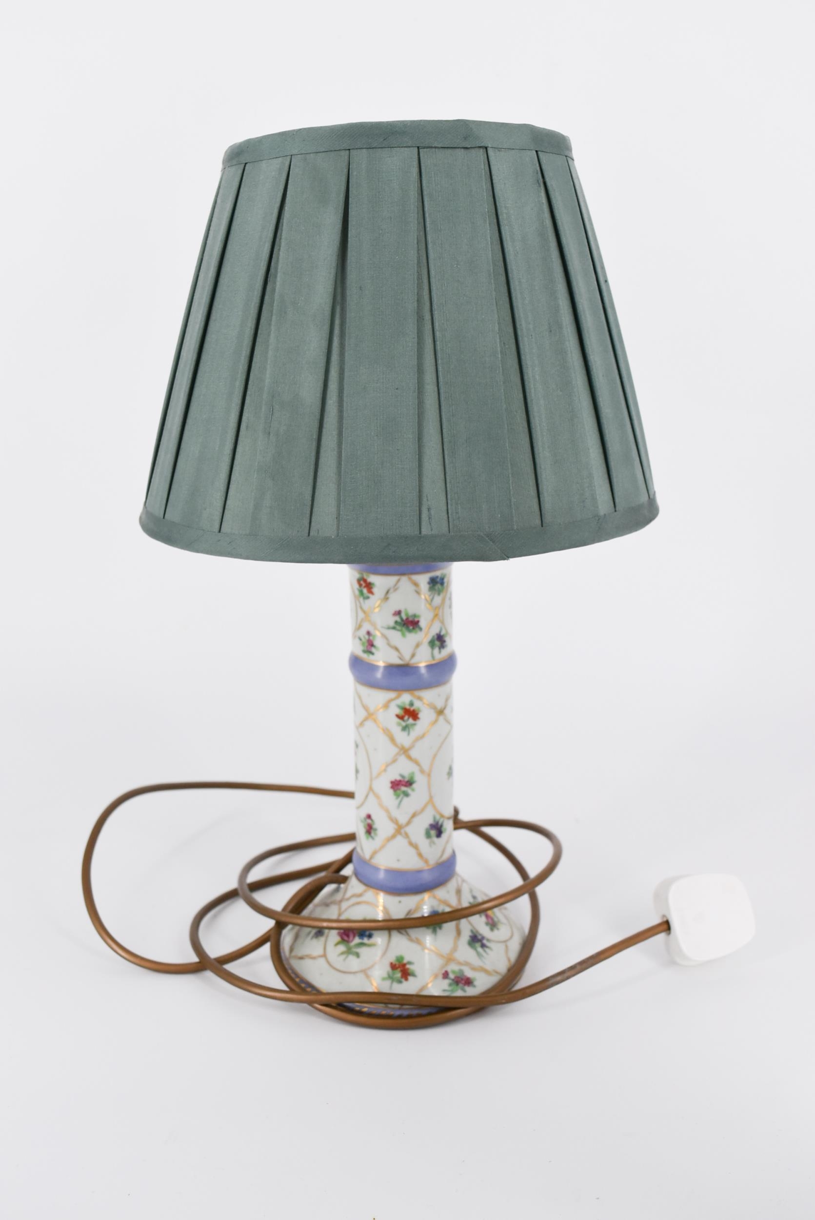 A hand painted floral design porcelain table lamp along with a moulded resin elephant form table - Image 4 of 4