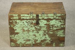 A 19th century Indian green painted camphor wood trunk, iron bound and of rectangular form. H.48 W.