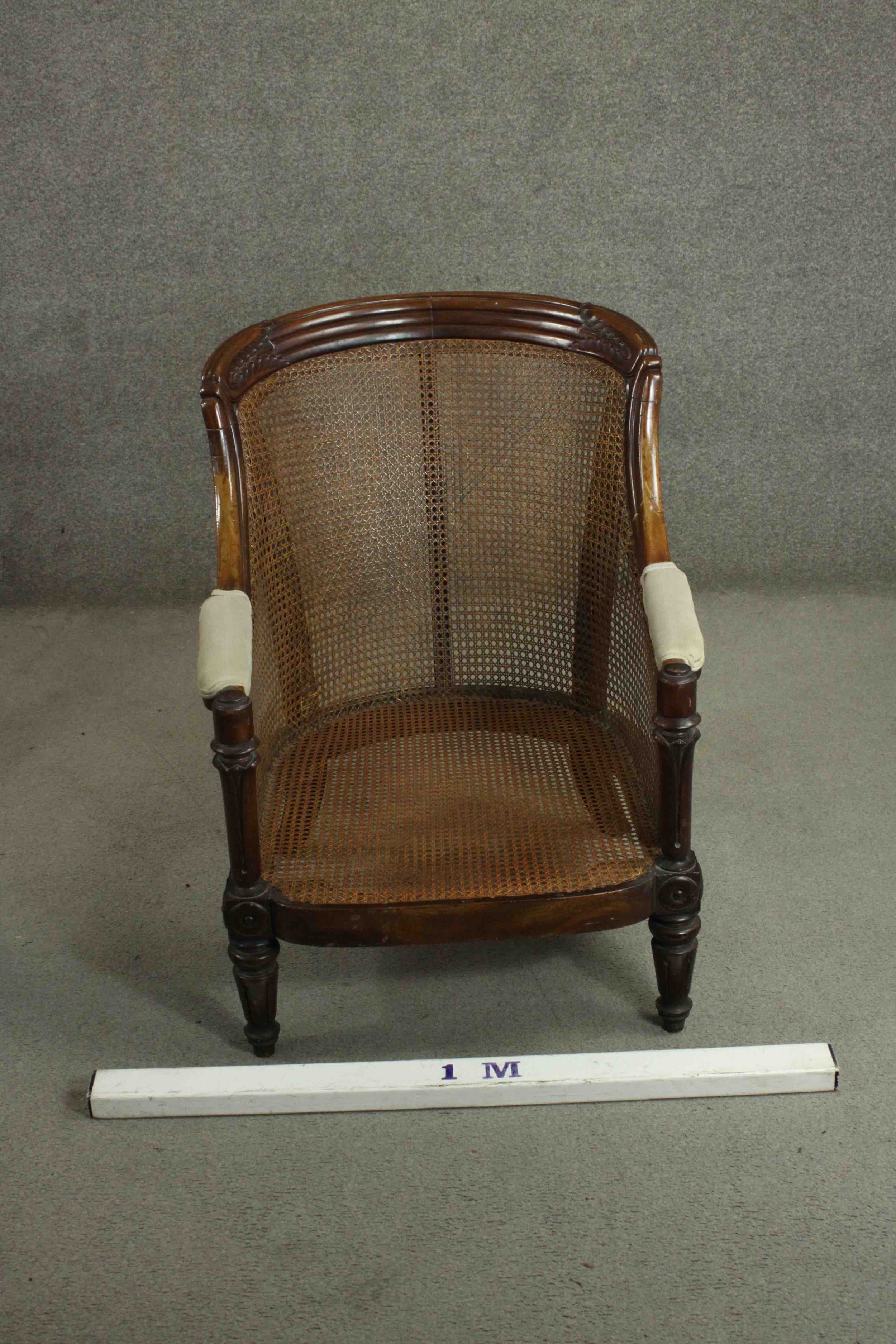 A William IV mahogany caned bergere tub chair, the reeded top rail with carved palm leaves to each - Image 2 of 8