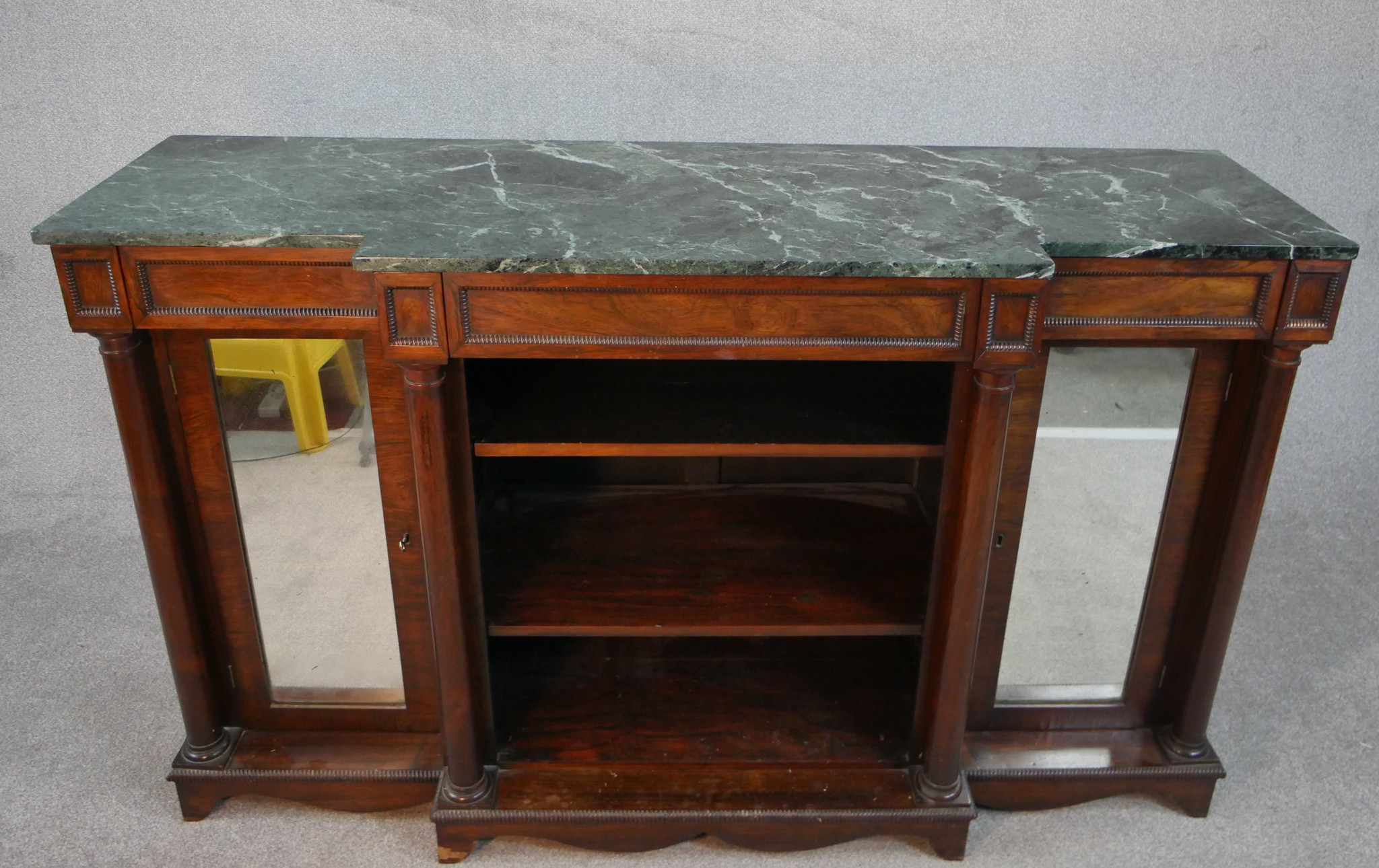 A William IV walnut breakfront sideboard, with a green marble top supported by four columns, with - Image 2 of 7