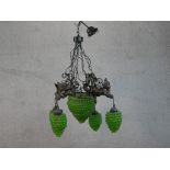 A spelter cherub and green glass grape design chandelier, with central large bunch of grapes with