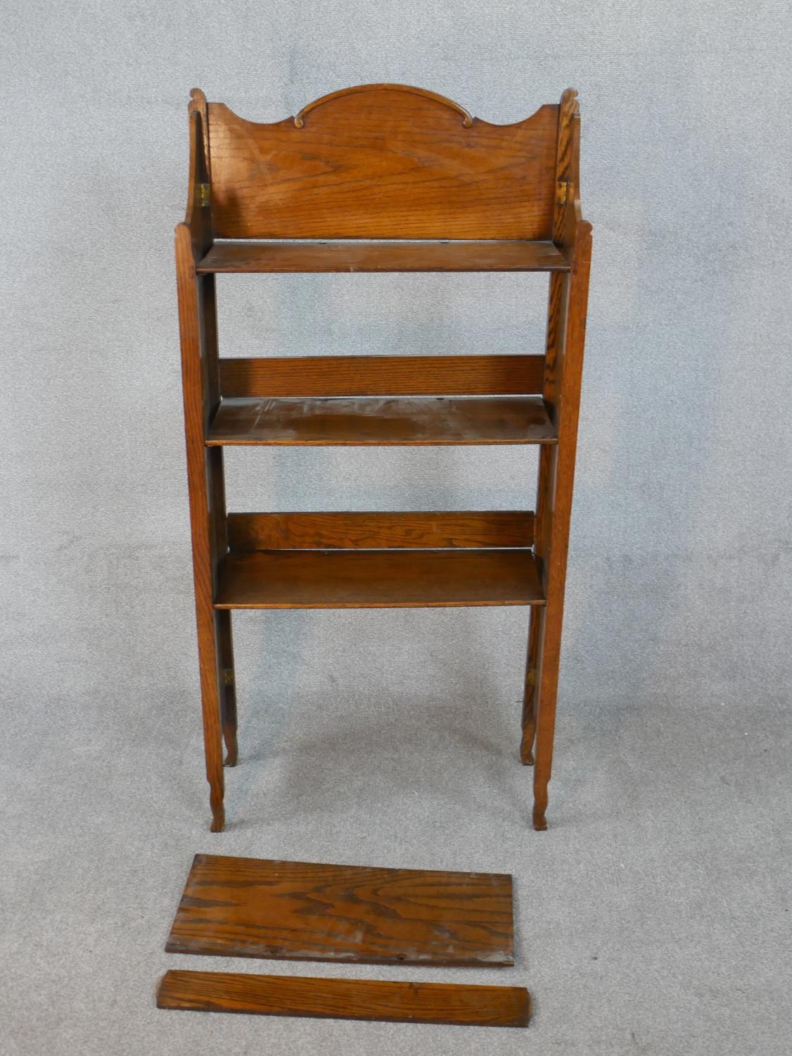 A late 19th century Arts and Crafts oak folding open bookcase. H.140 W.68 D.45cm - Image 2 of 5