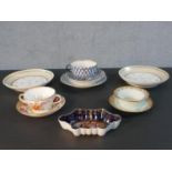 A collection of hand painted porcelain, including a Royal Vienna pin dish hand painted with a