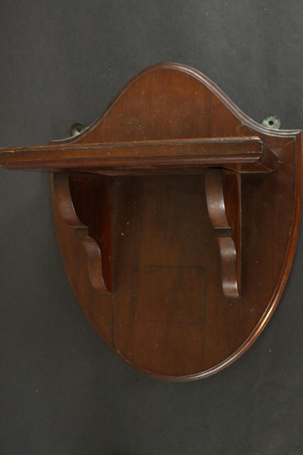 A Victorian walnut wall shelf on a shield shaped back. H.45 W.37 D.23cm. - Image 3 of 6