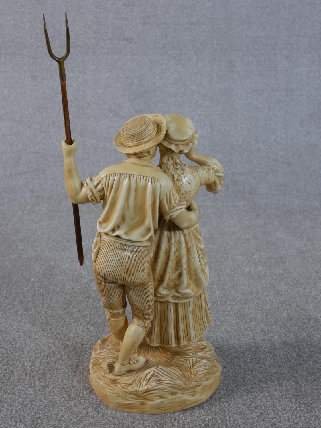 A large Victorian cream glazed ceramic figure group of the haymaker and the milk maid embracing. The - Image 4 of 5