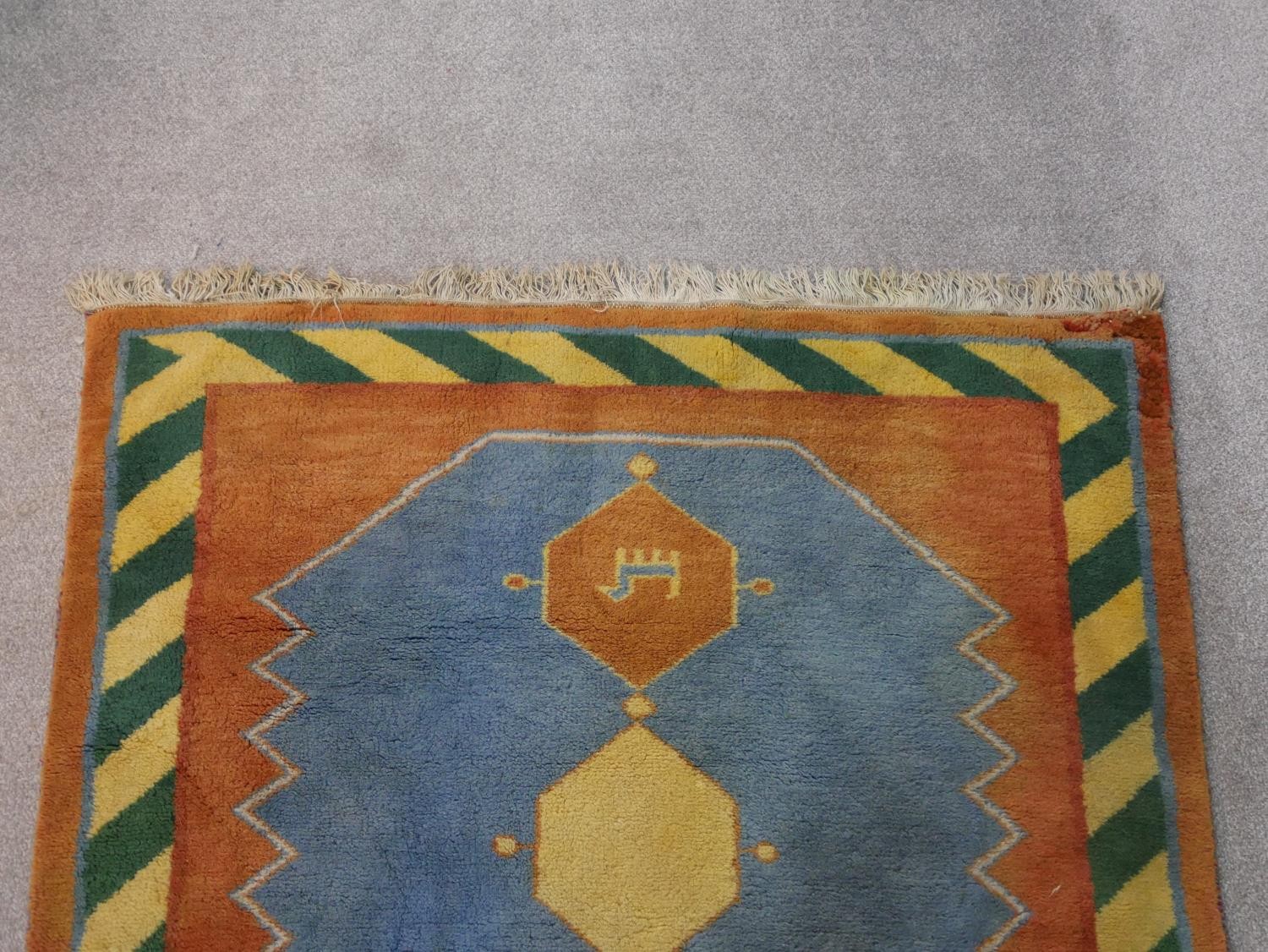 A blue ground hand made Persian Gabbeh rug. L.182 W.120cm - Image 5 of 8