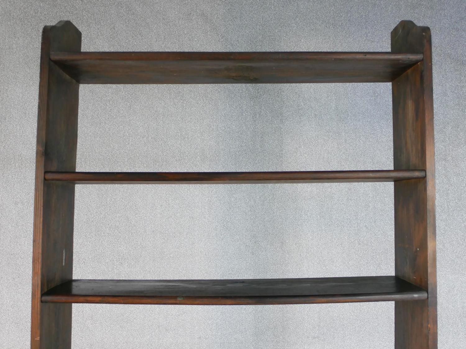 A late 20th century stained pine open bookcase, with seven shelves. H.200 W.92 D.22cm - Image 4 of 4