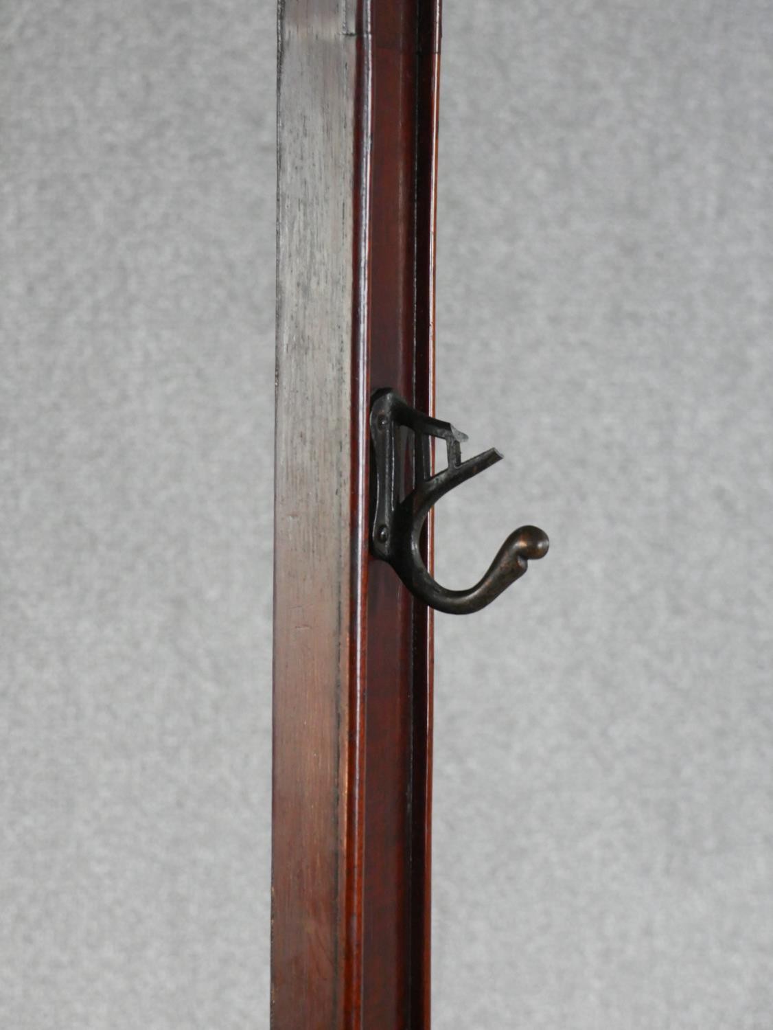 A Victorian Gothic Revival walnut hallstand, of arched form with a pierced panel centred by a - Image 6 of 6