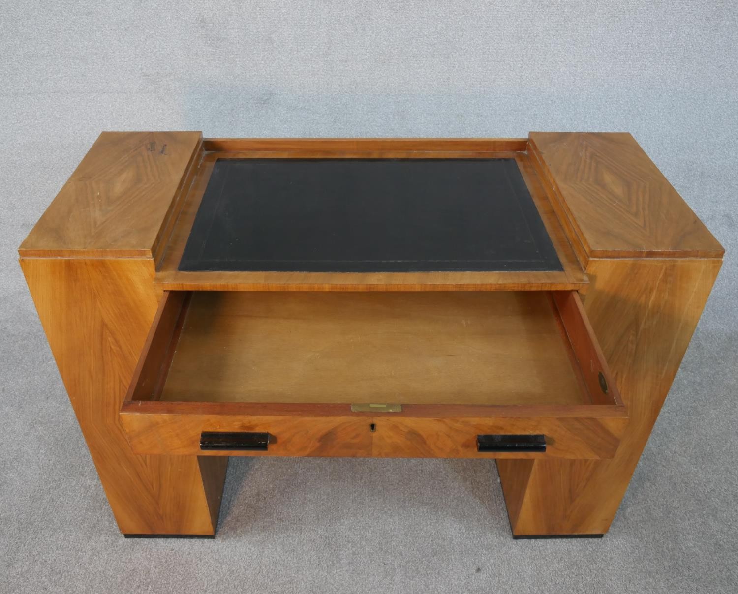 An Art Deco quarter veneered walnut desk with open bookshelves to each pedestal by Maple and Co. H. - Image 3 of 6