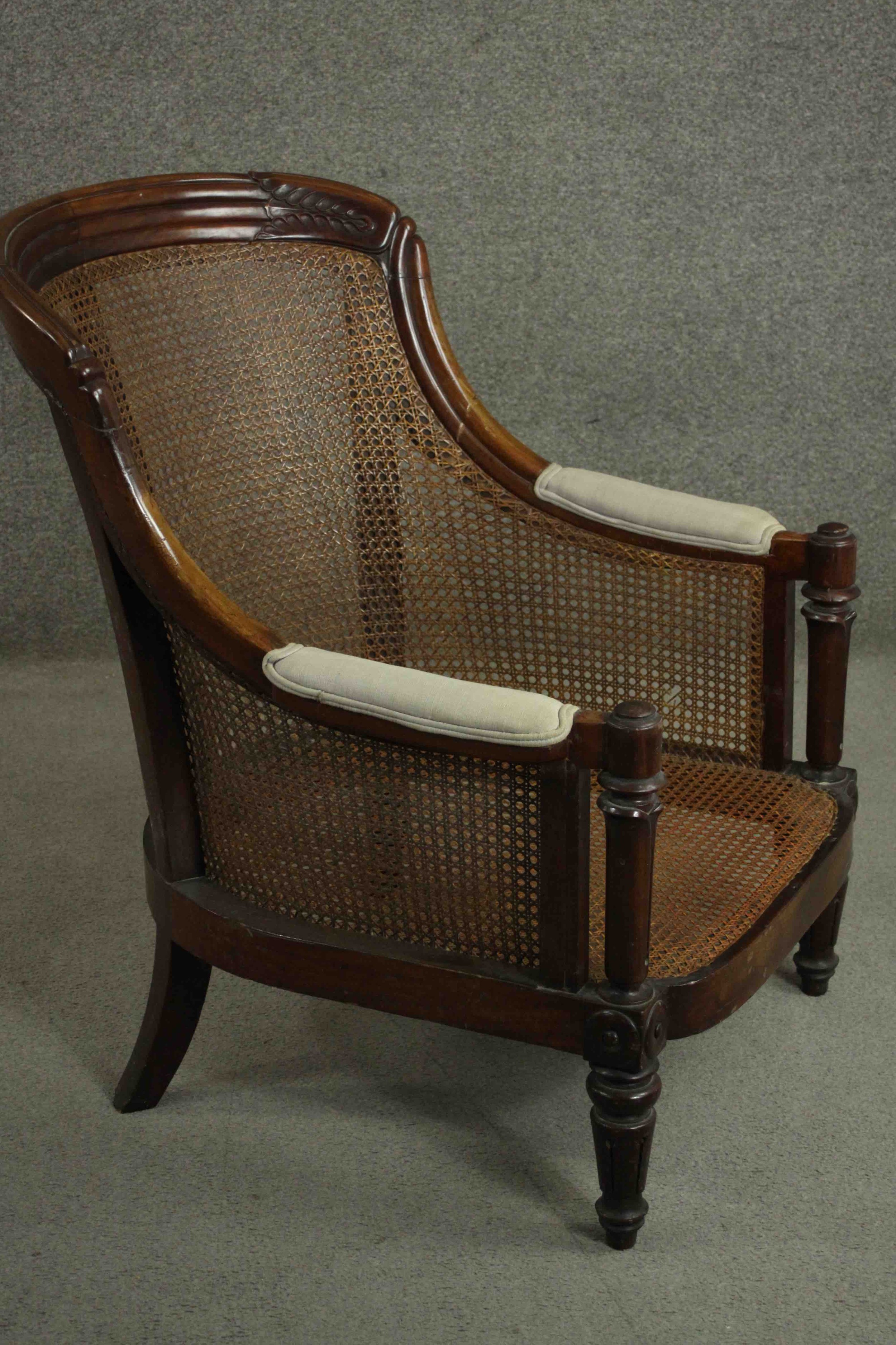 A William IV mahogany caned bergere tub chair, the reeded top rail with carved palm leaves to each - Image 3 of 8