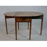 A Victorian walnut Pembroke table, with two drop leaves over a single end drawer, on square