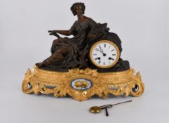 A French gilt ormolu and spelter Classical lady design mantle clock on a gilt pierced foliate