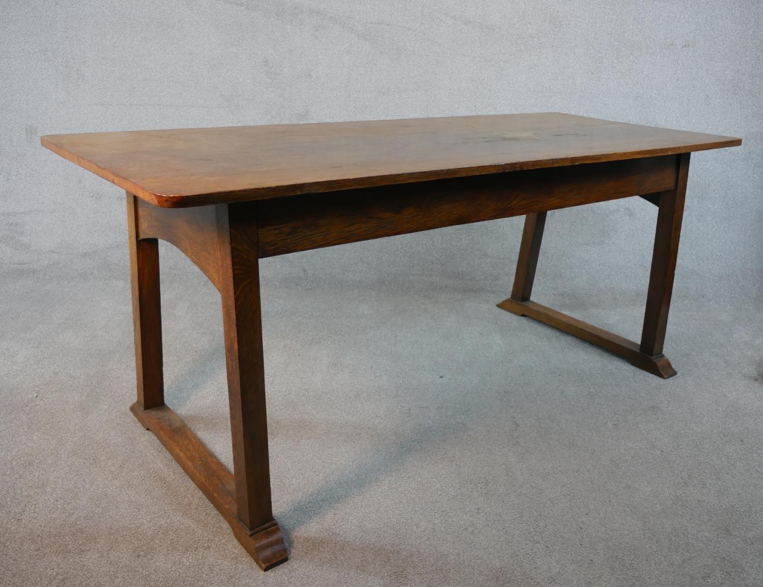 A Heals style Arts and Crafts oak refectory dining table on square trestle supports resting on - Image 5 of 5