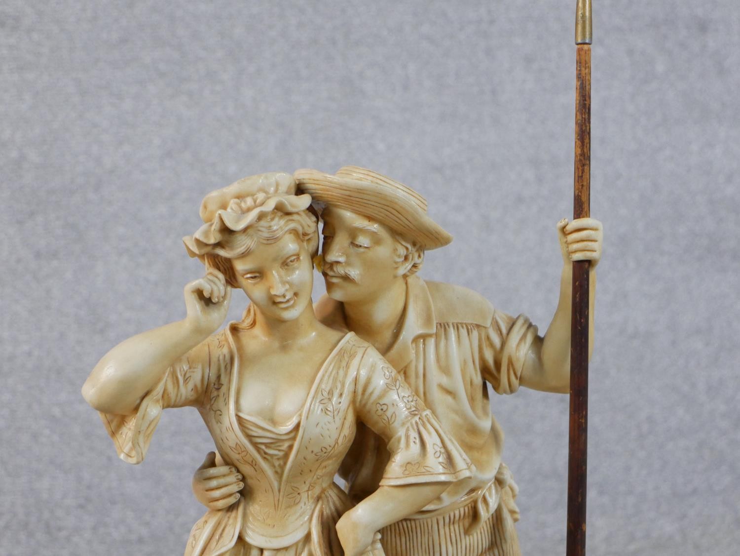 A large Victorian cream glazed ceramic figure group of the haymaker and the milk maid embracing. The - Image 2 of 5