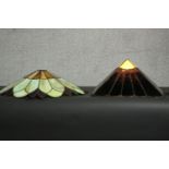 Two Tiffany style stained glass lamp shades, one of pyramid form, the other more foliate. H.17 Dia.