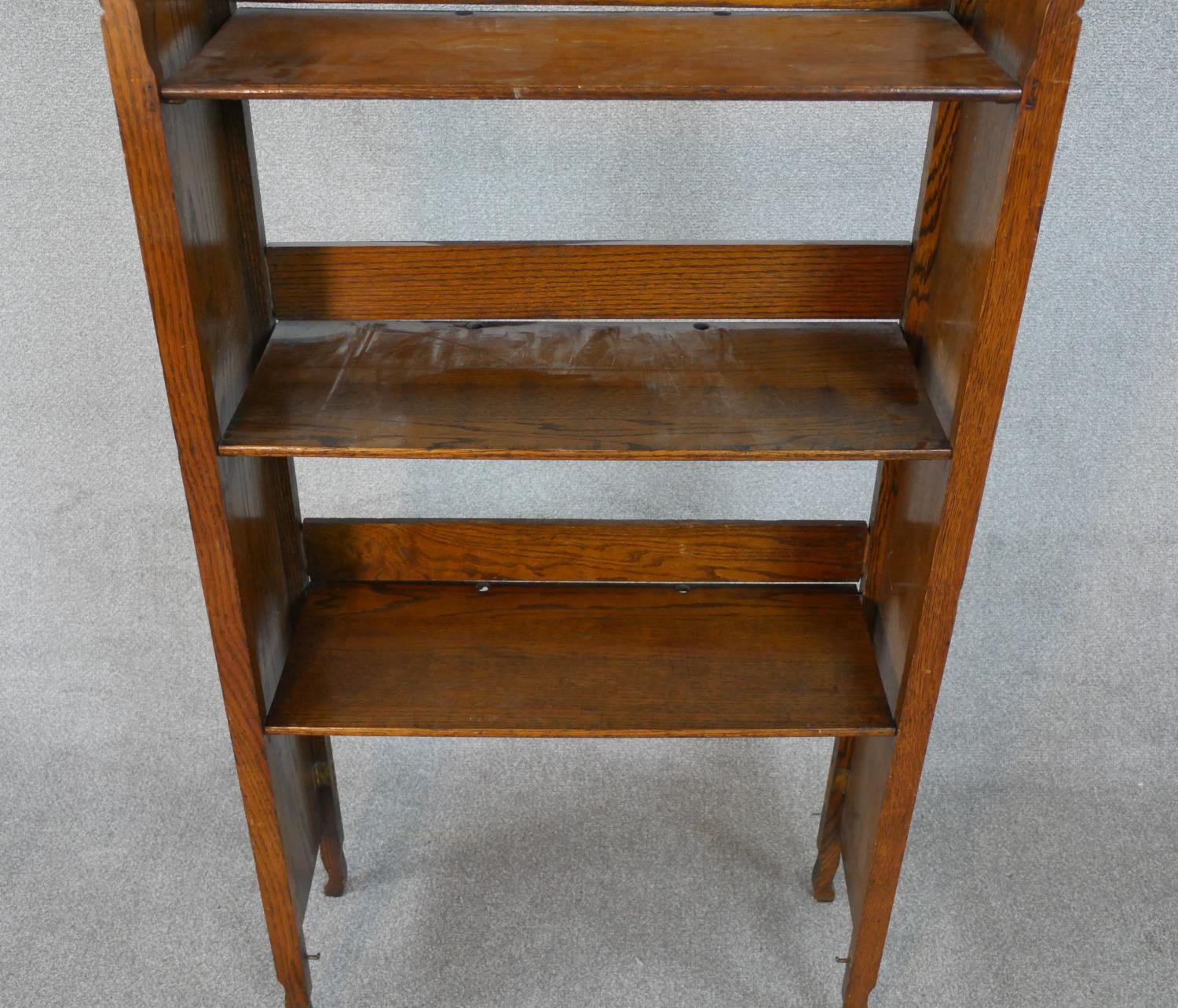 A late 19th century Arts and Crafts oak folding open bookcase. H.140 W.68 D.45cm - Image 4 of 5