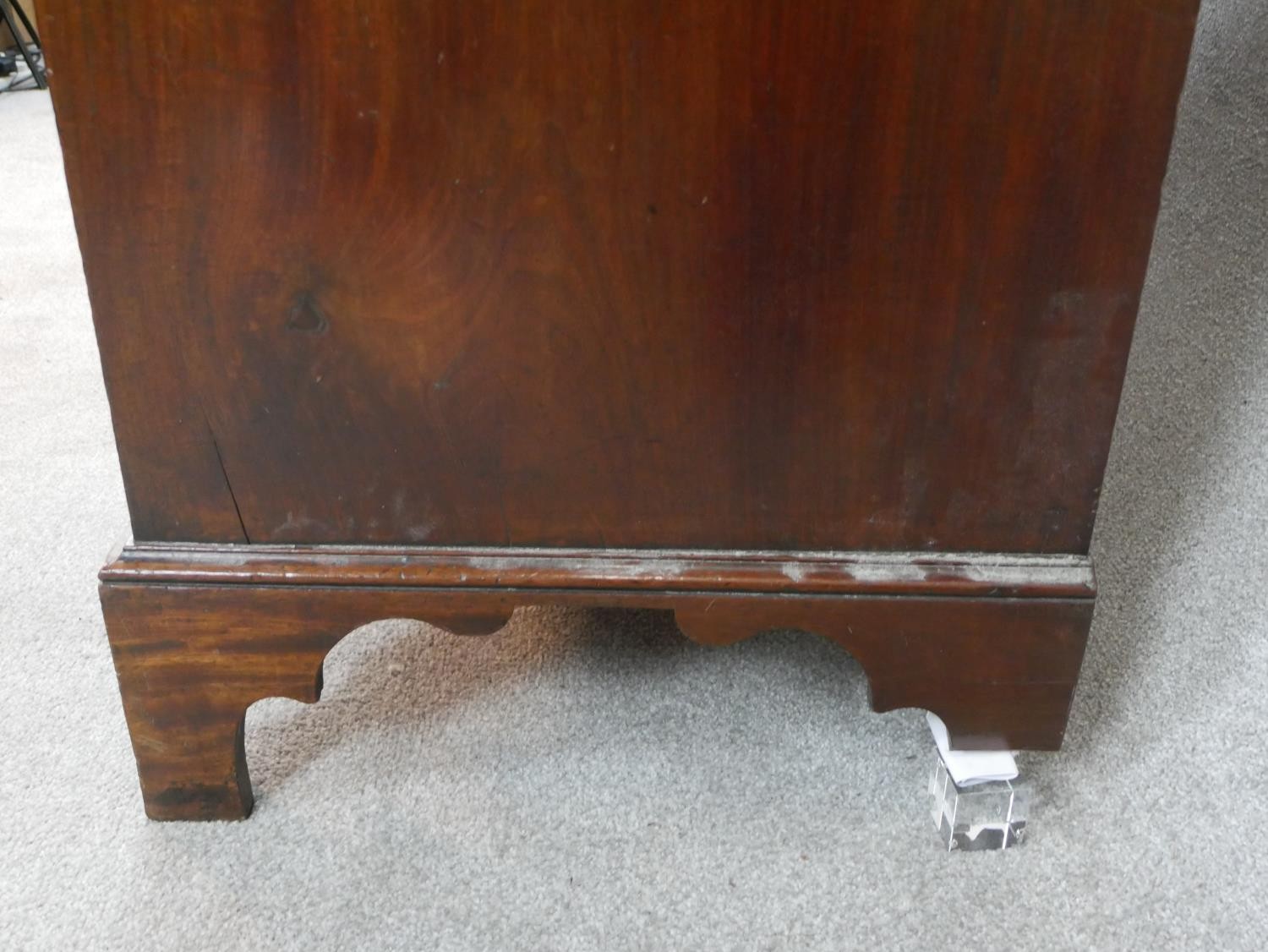 A Georgian mahogany press cupboard the upper section with flame mahogany panel doors enclosing - Image 6 of 7