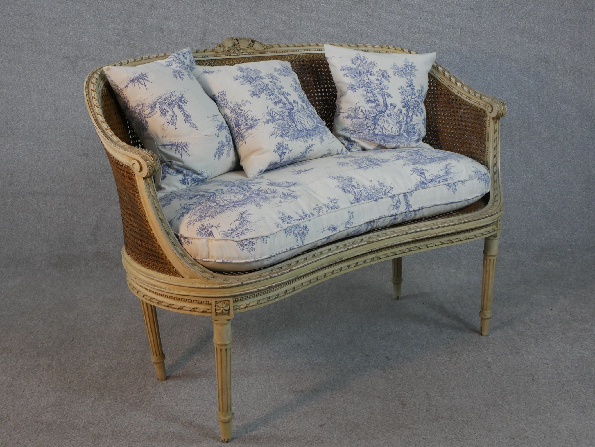 A French Louis XVI style painted canape sofa, with double caned back and sides, and loose cushions - Image 7 of 7