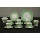 A circa 1940's Palissy Ware china coffee set, with printed green patterned borders. H.22 W.22cm. (